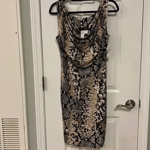 Snakeskin print dress, colors are black and beige, size 6, new with tags